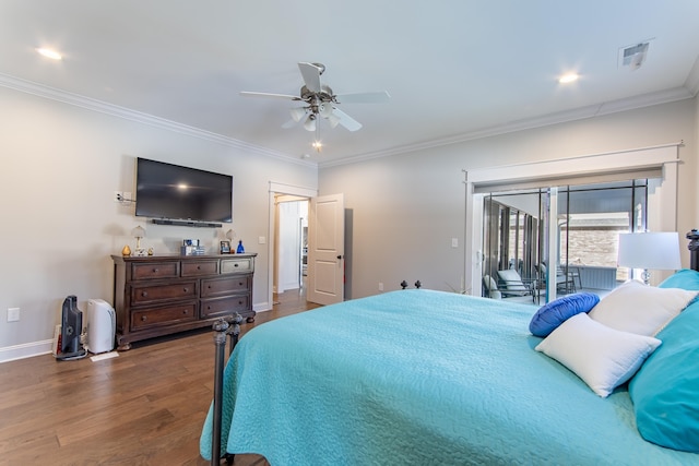 bedroom featuring crown molding, visible vents, dark wood finished floors, and baseboards