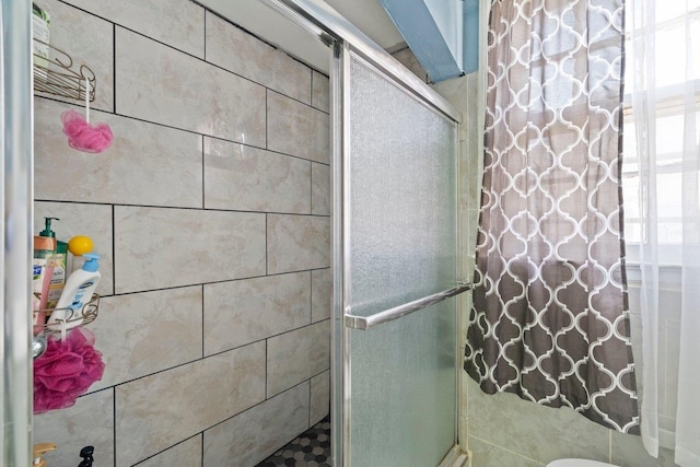 bathroom featuring a stall shower