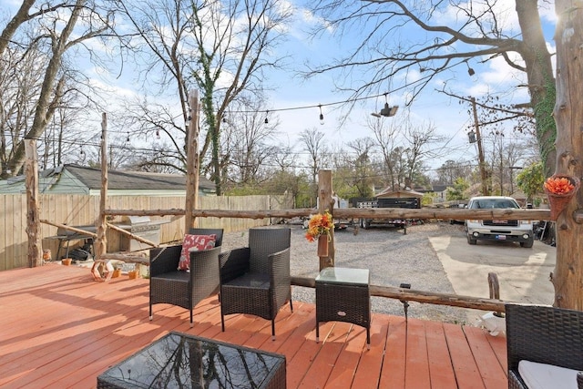 wooden deck featuring fence