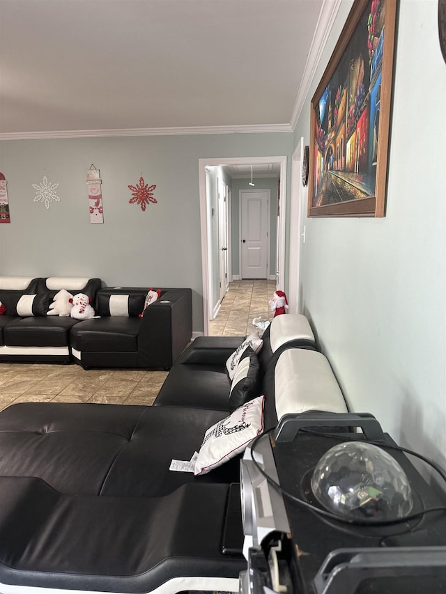 living area featuring light tile patterned floors and crown molding