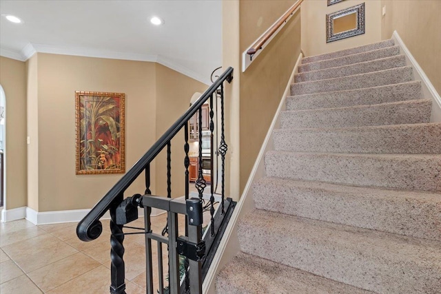 stairs featuring baseboards, ornamental molding, tile patterned flooring, and recessed lighting