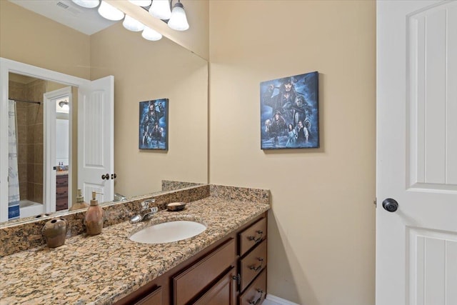 bathroom featuring visible vents and vanity