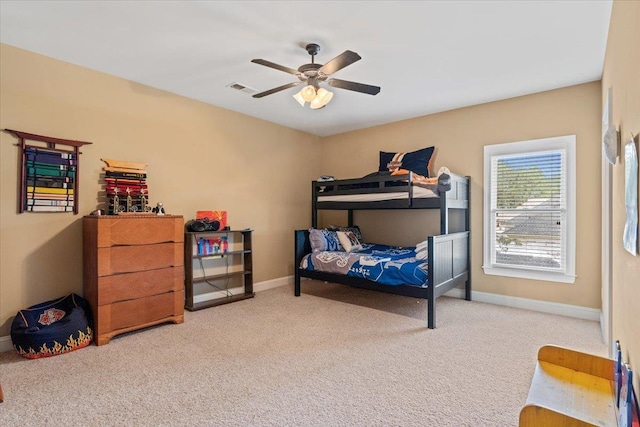 bedroom with a ceiling fan, carpet, visible vents, and baseboards