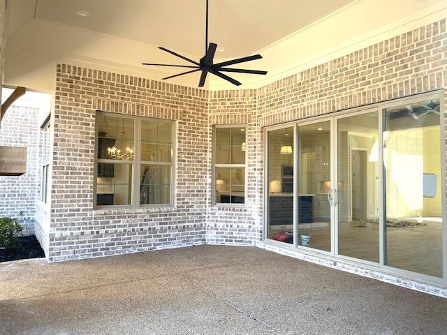 view of patio / terrace with a ceiling fan