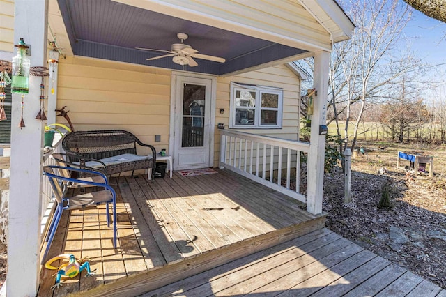 wooden terrace with ceiling fan