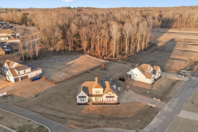 bird's eye view featuring a forest view