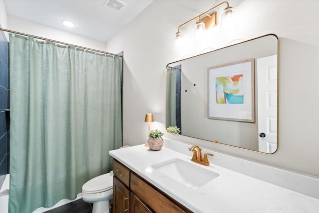 bathroom with toilet, visible vents, shower / bath combination with curtain, and vanity