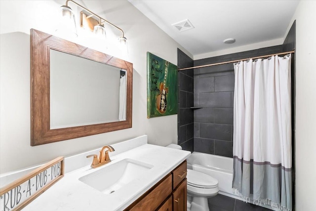 bathroom featuring toilet, visible vents, vanity, tile patterned floors, and shower / bathtub combination with curtain