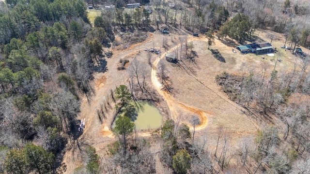 bird's eye view featuring a view of trees