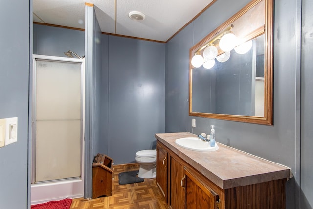 full bath with a textured ceiling, toilet, a shower with shower door, vanity, and ornamental molding