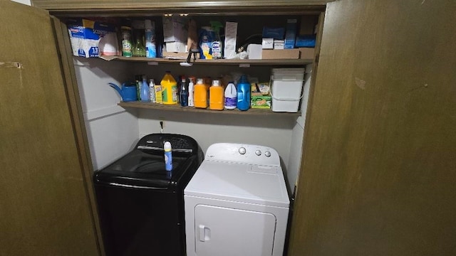 laundry room with washing machine and dryer and laundry area