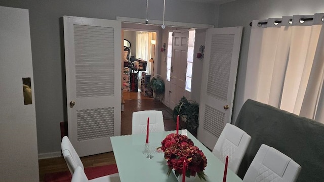 dining room with wood finished floors