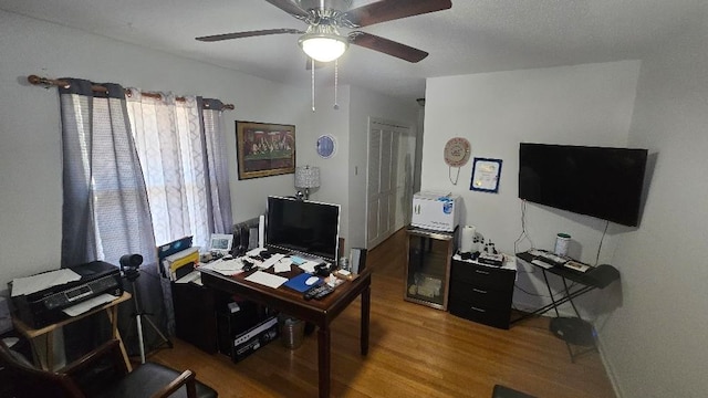 office featuring ceiling fan and wood finished floors