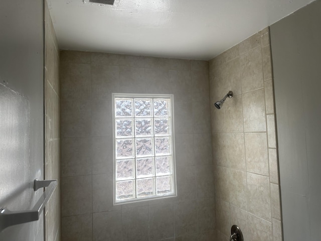 bathroom featuring walk in shower