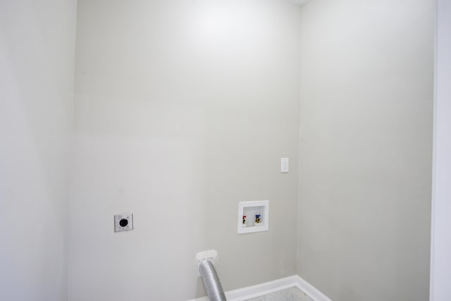 laundry area featuring hookup for a washing machine, baseboards, laundry area, and electric dryer hookup