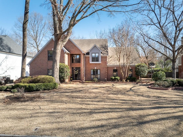 view of front of home with brick siding