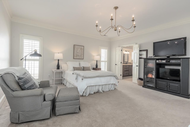 carpeted bedroom featuring connected bathroom, a notable chandelier, and crown molding