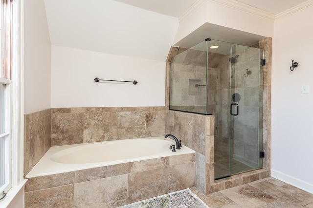 full bathroom featuring a garden tub, a shower stall, and ornamental molding