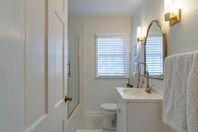 full bathroom with toilet, shower / bath combination with glass door, tile patterned floors, crown molding, and vanity