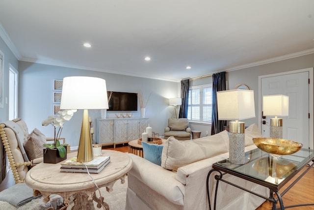 living room featuring ornamental molding, recessed lighting, and wood finished floors