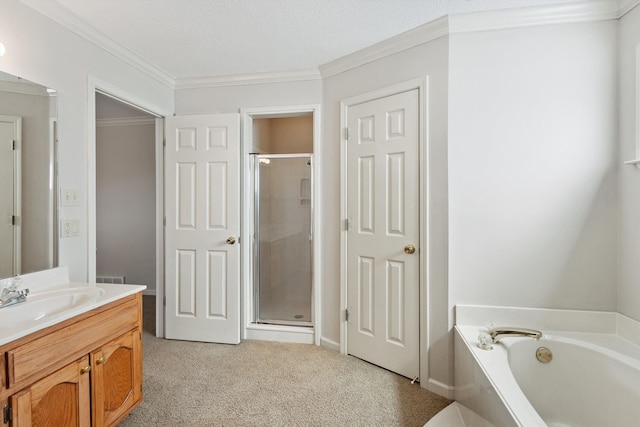 bathroom featuring carpet, crown molding, a stall shower, vanity, and a bath