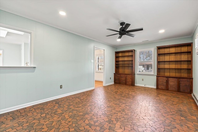 unfurnished bedroom featuring recessed lighting, ornamental molding, stone finish flooring, ceiling fan, and baseboards