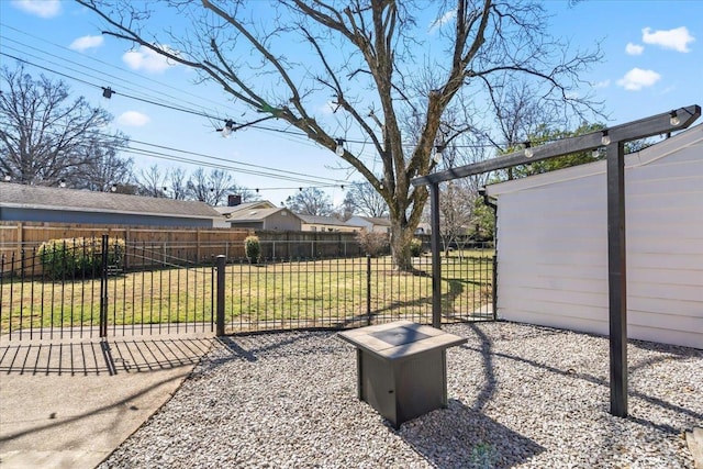 view of yard featuring a gate and fence