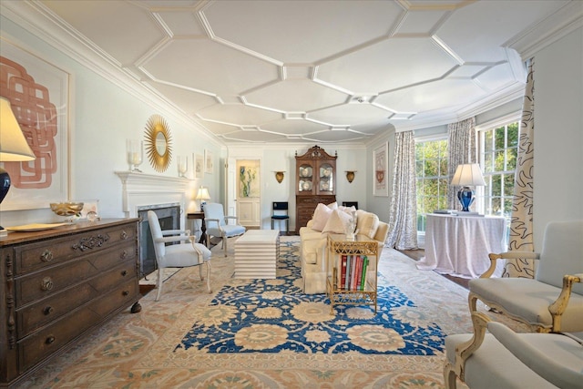 living area featuring ornamental molding and a fireplace