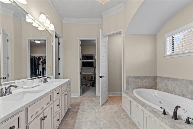 bathroom featuring double vanity, a sink, ornamental molding, and a tub with jets