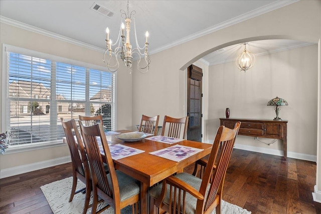 dining area featuring baseboards, a chandelier, visible vents, arched walkways, and hardwood / wood-style flooring
