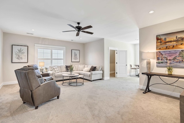 living area featuring visible vents, baseboards, light colored carpet, ceiling fan, and recessed lighting