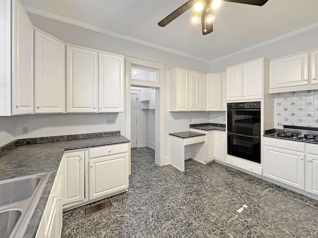 kitchen featuring dobule oven black, white cabinets, ornamental molding, stovetop, and dark countertops