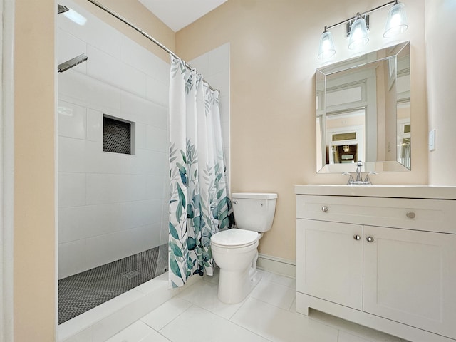 full bathroom featuring vanity, tile patterned flooring, a tile shower, and toilet