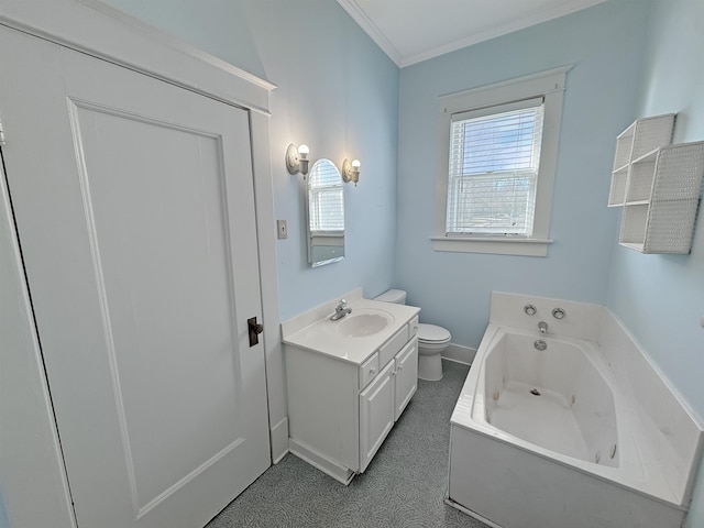 bathroom with toilet, vanity, baseboards, ornamental molding, and a tub with jets