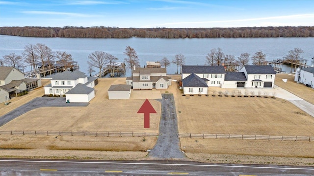 drone / aerial view featuring a water view