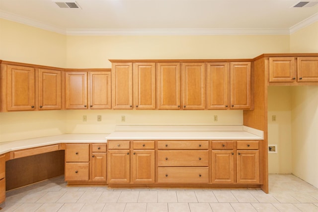 kitchen featuring visible vents, light countertops, and built in study area