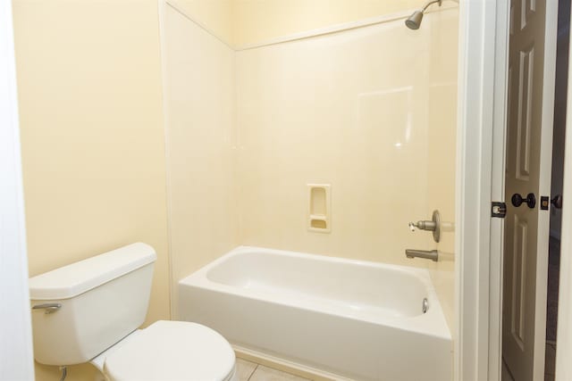 bathroom with shower / bath combination and toilet