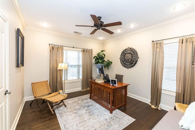 office featuring ceiling fan, dark wood-style flooring, visible vents, baseboards, and crown molding