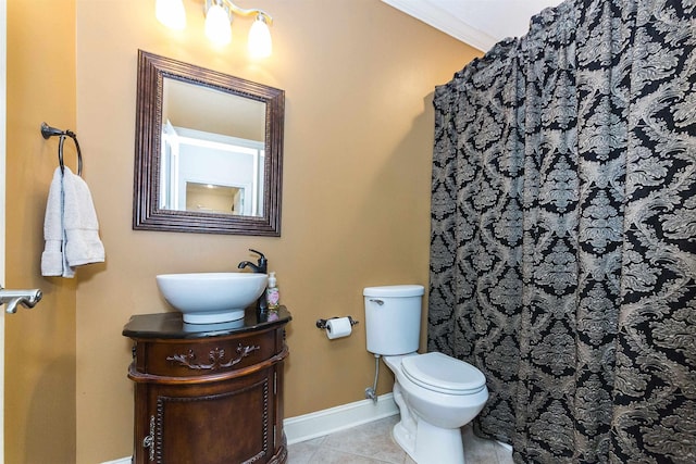 bathroom featuring baseboards, toilet, a shower with curtain, tile patterned flooring, and vanity