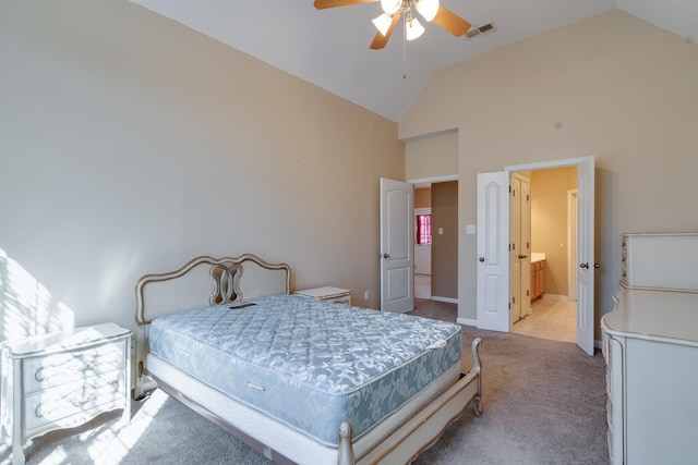 bedroom with visible vents, light carpet, connected bathroom, high vaulted ceiling, and baseboards