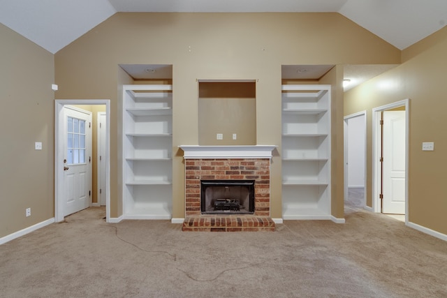 unfurnished living room with lofted ceiling, baseboards, and built in features