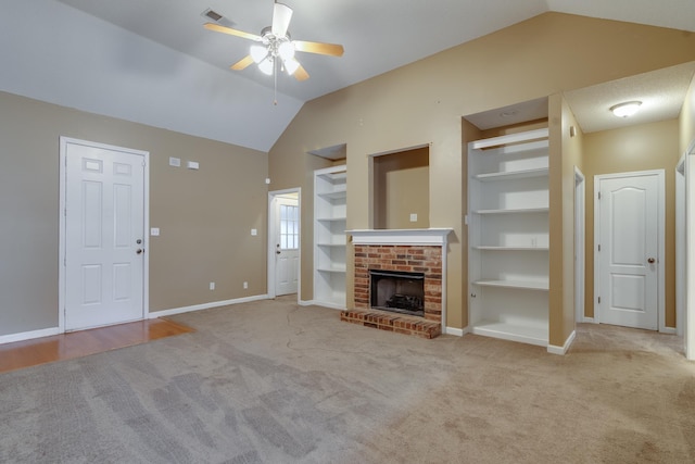 unfurnished living room featuring lofted ceiling, visible vents, baseboards, a ceiling fan, and built in features