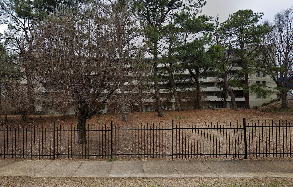 view of property's community with fence