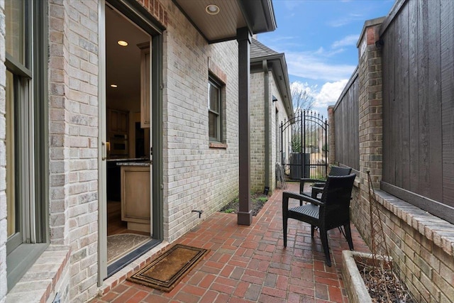 view of patio / terrace with a gate