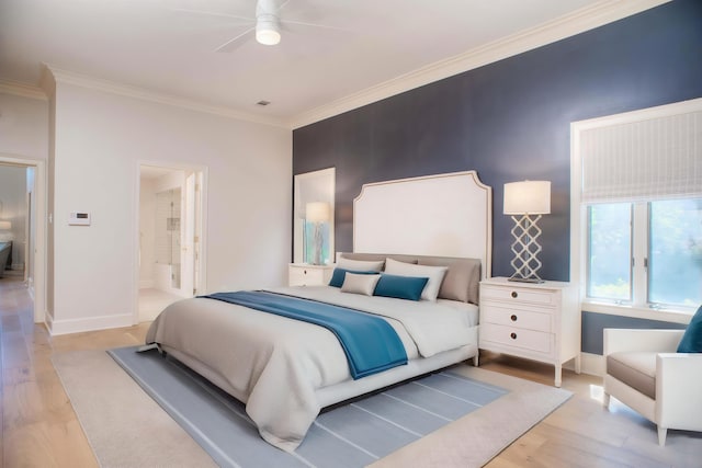 bedroom with light wood finished floors, baseboards, and crown molding