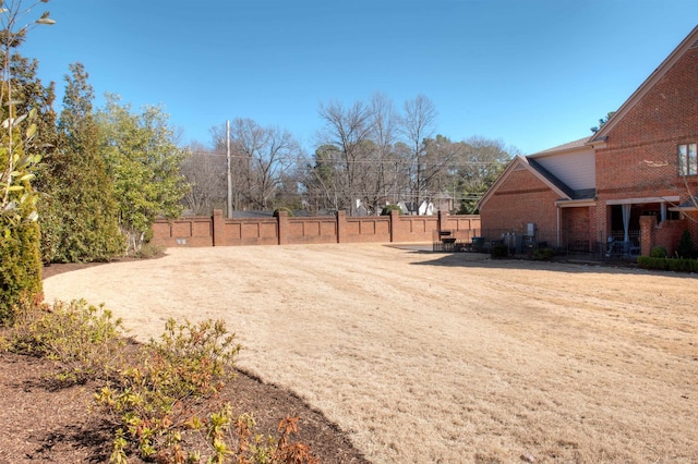 view of yard featuring fence