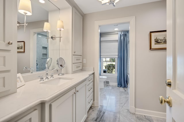 full bath featuring toilet, vanity, baseboards, marble finish floor, and a shower with curtain