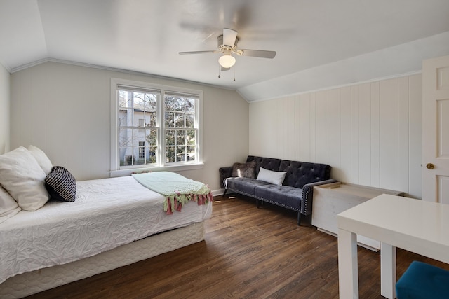 bedroom with lofted ceiling, dark wood finished floors, and a ceiling fan