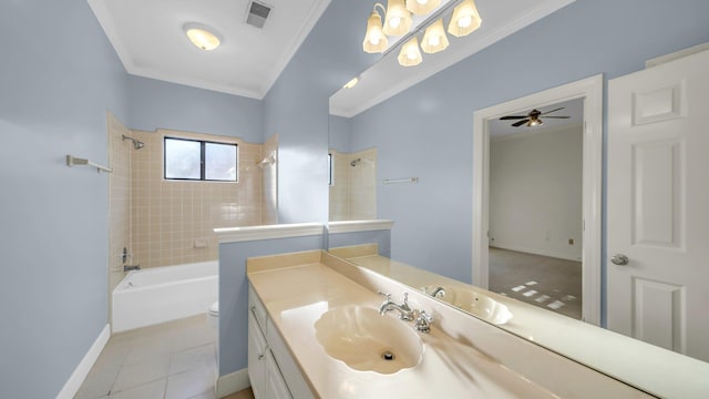 bathroom with visible vents, toilet, ornamental molding, tile patterned floors, and vanity