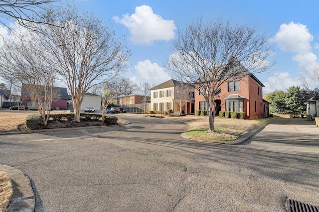 view of street featuring curbs